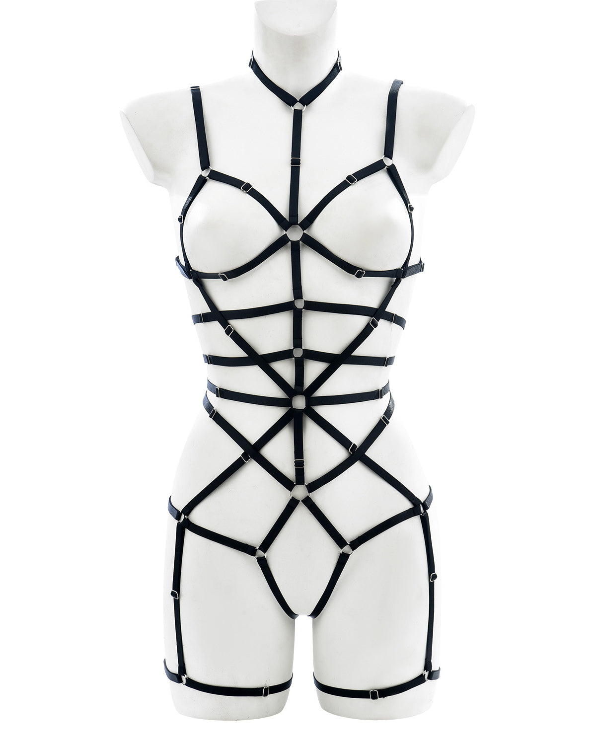 Full body view of black bondage harness with multiple elastic straps, silver rings, and adjustable chest and leg loops – displayed on mannequin