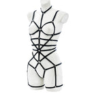 black strappy lingerie harness showing elastic waist, thong cut, and adjustable shoulder and leg straps – soft bondage style