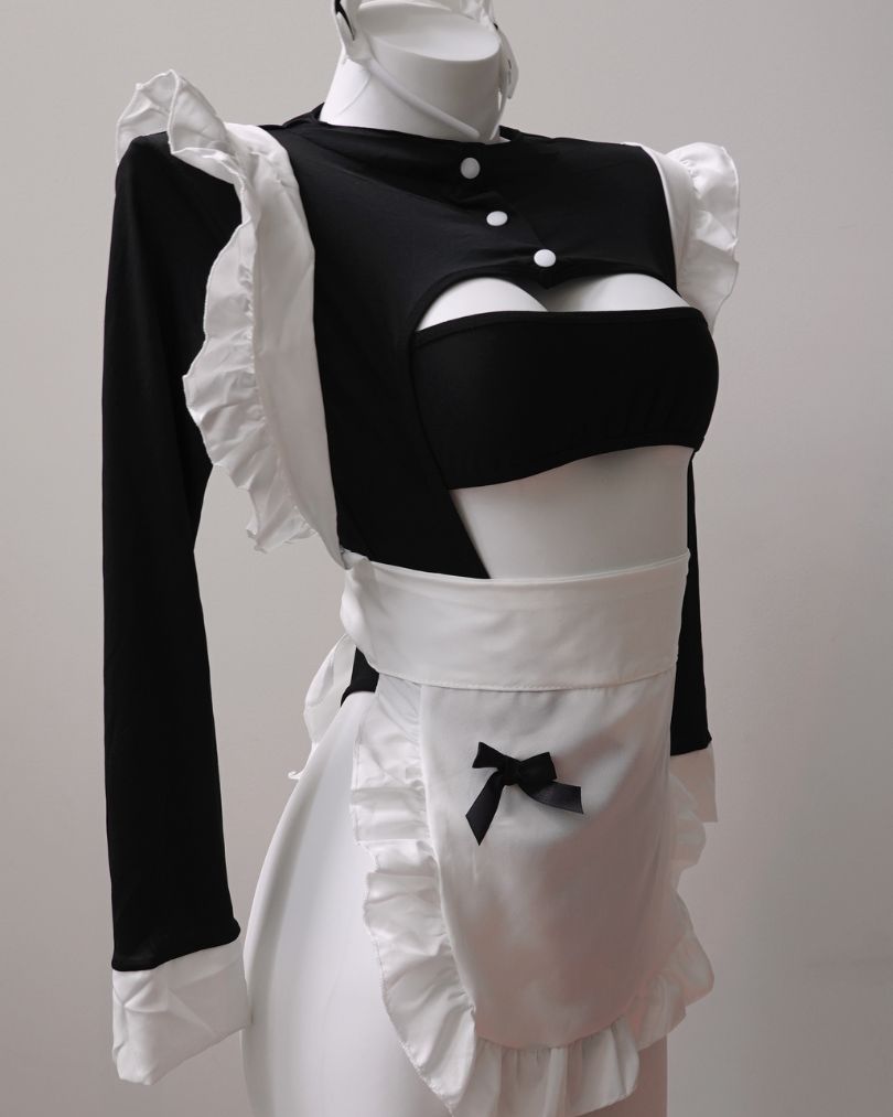 Black and white maid lingerie on a mannequin against a gray background