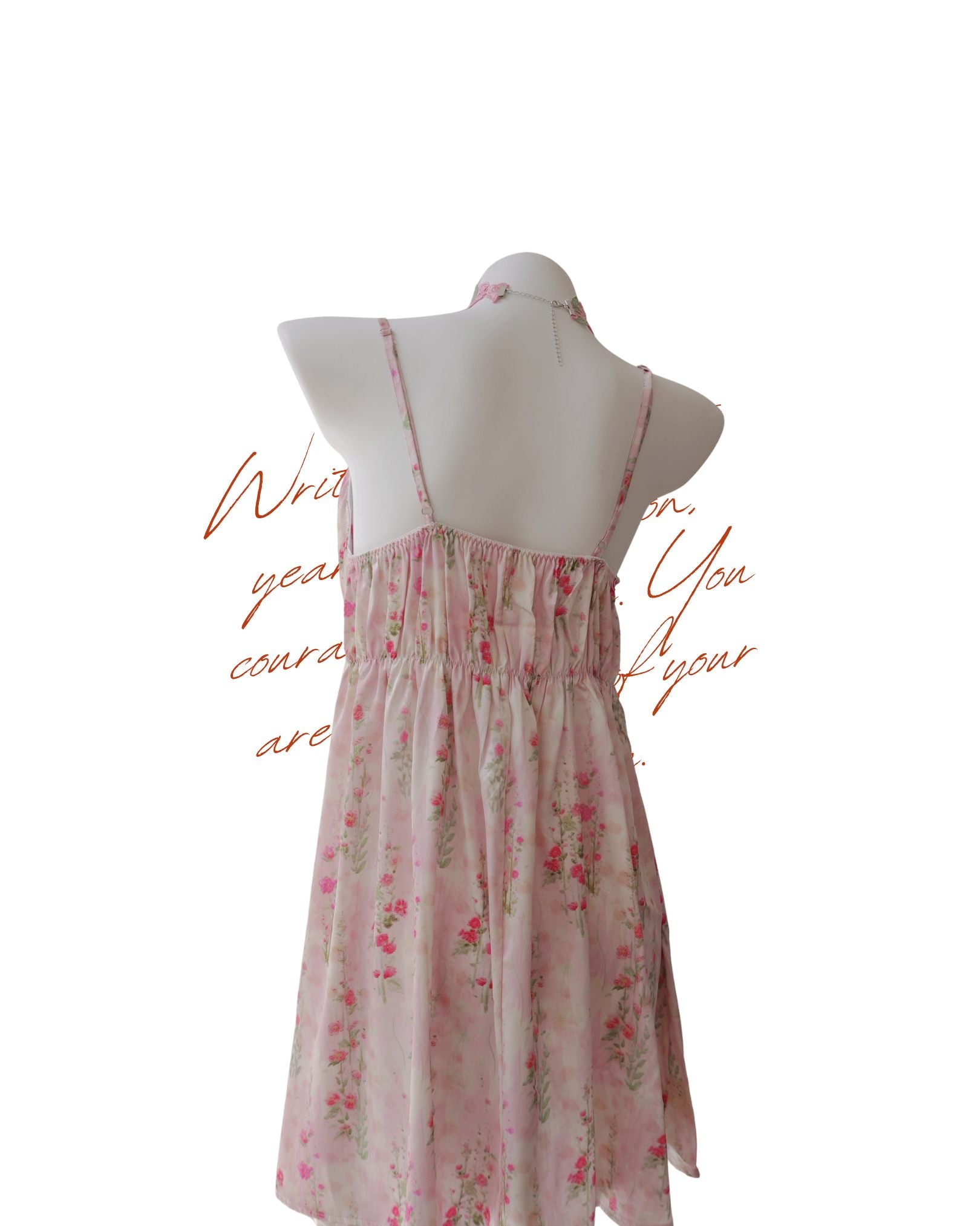 Floral dress on a mannequin with text overlay on a white background
