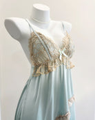 Mannequin wearing a fairyberry light blue nightdress with lace details on a plain background