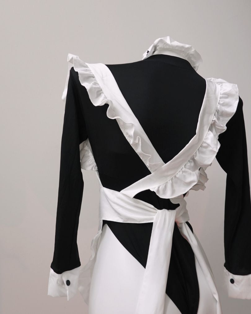 maid lingerie, Black and white dress with ruffled details on a mannequin against a gray background