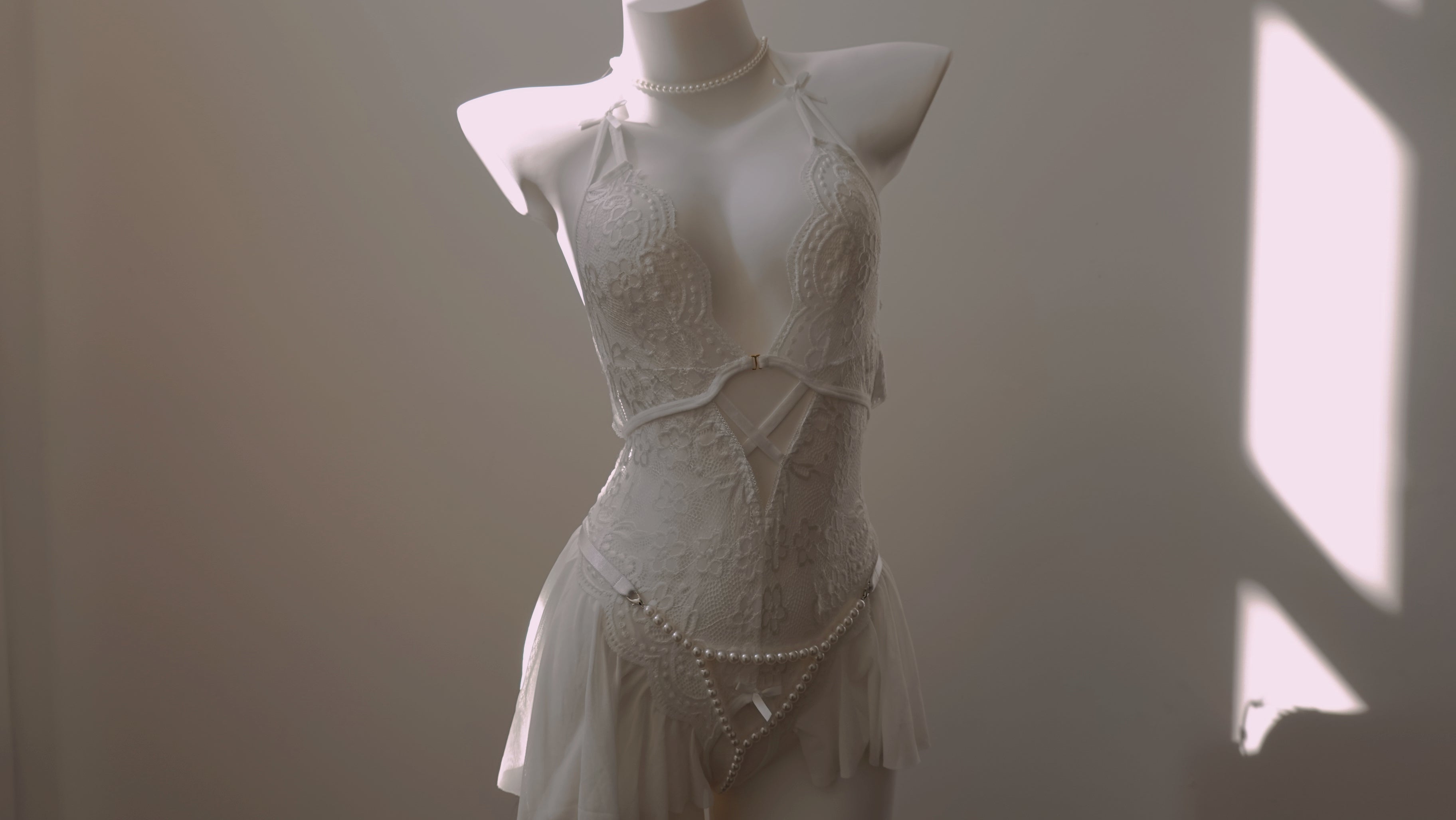 Mannequin wearing a light-colored lace Fairy Berry nightdressdress