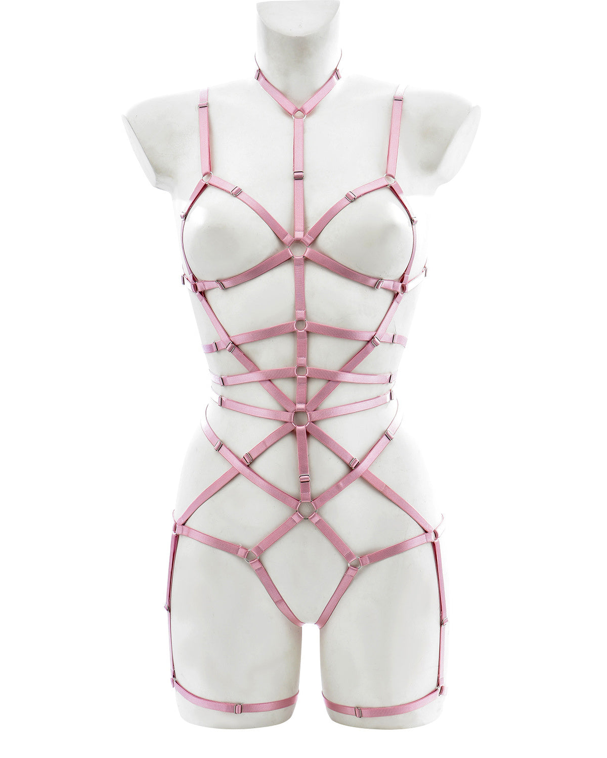 Full body view of pink bondage harness with multiple elastic straps, silver rings, and adjustable chest and leg loops – displayed on mannequin