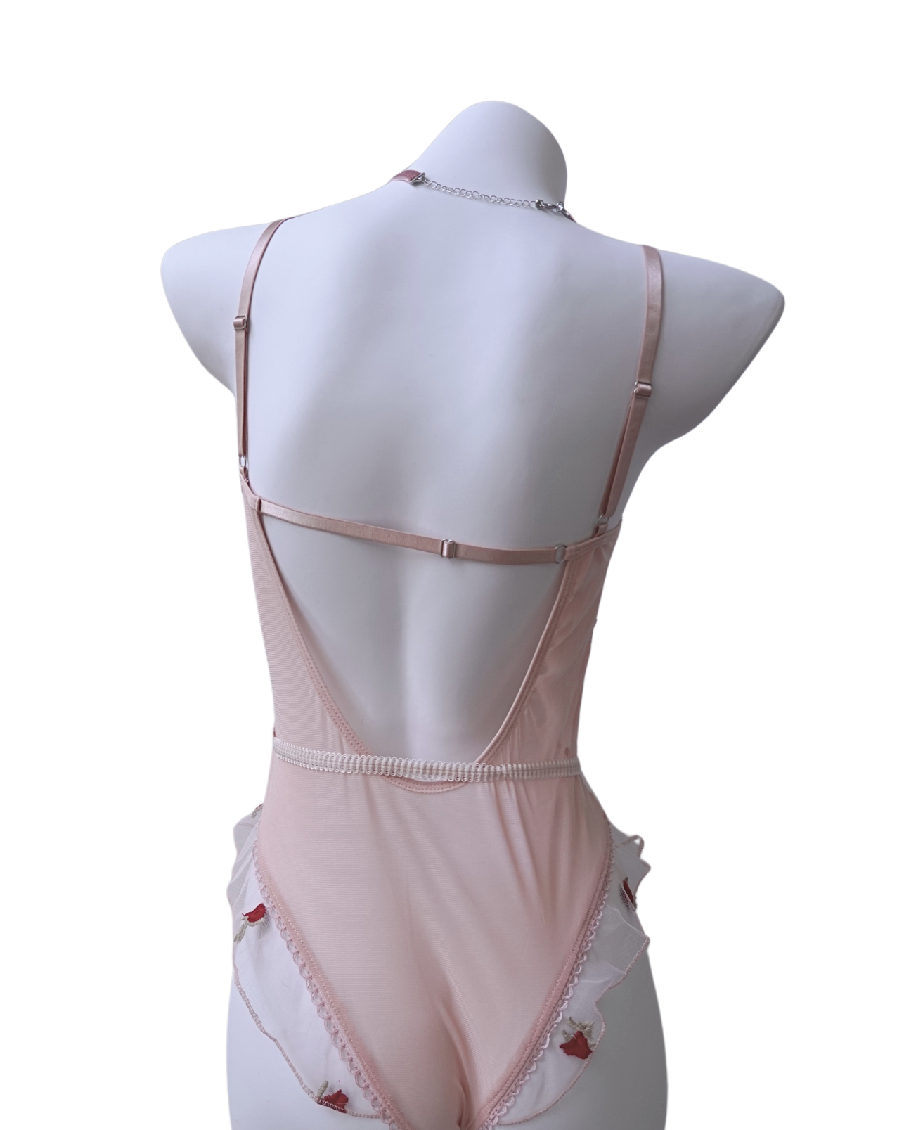 Pink mesh bodysuit with small rose embroidery – romantic and artistic design