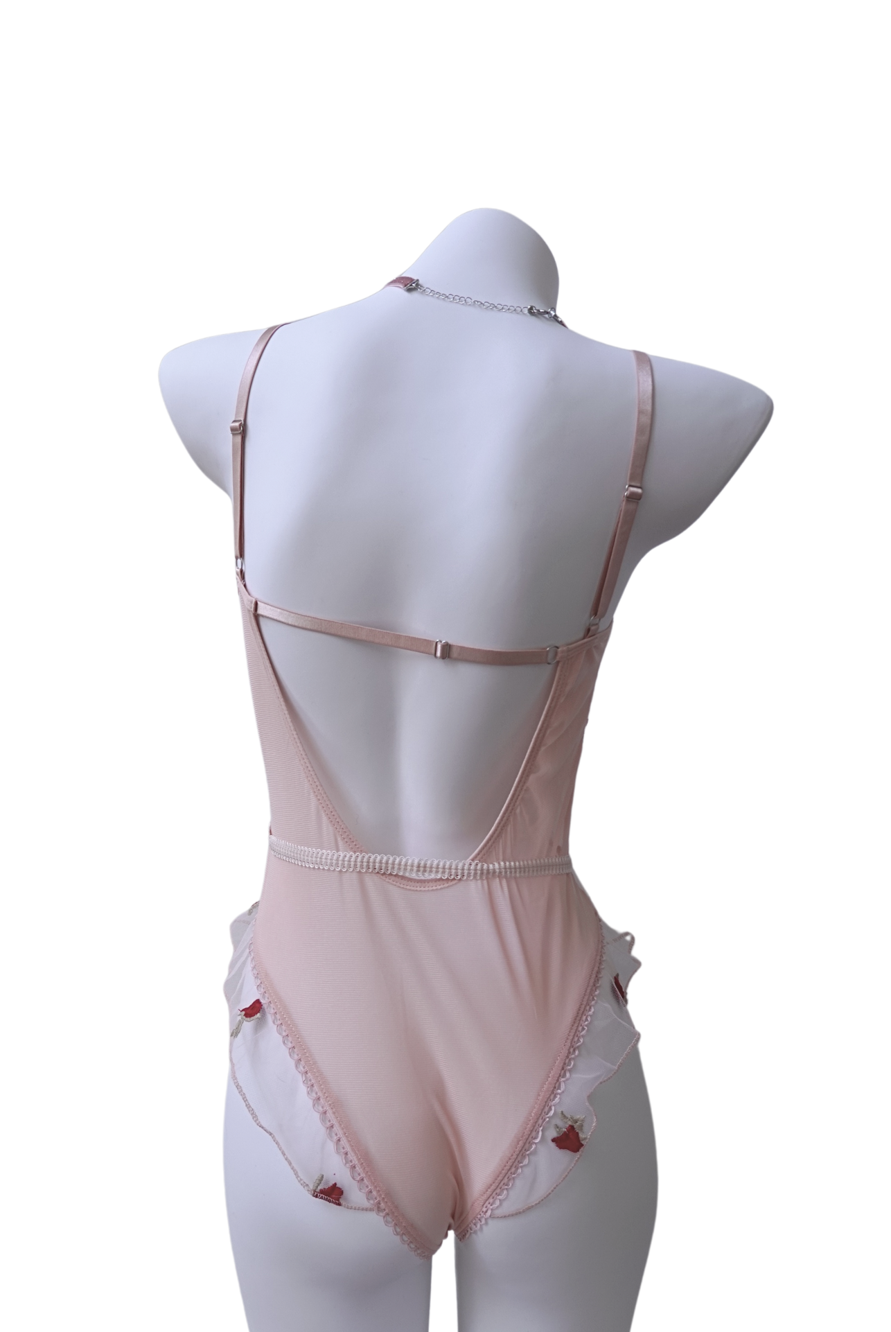 Pink mesh bodysuit with small rose embroidery – romantic and artistic design