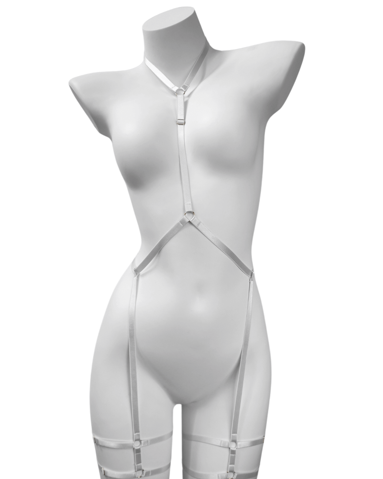 Minimalist white body harness with elastic neck, waist, and thigh straps – displayed on mannequin with silver ring accents