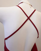 Red strappy top on a mannequin against a neutral background by fairyberry