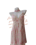 Floral dress on a mannequin with text overlay on a white background