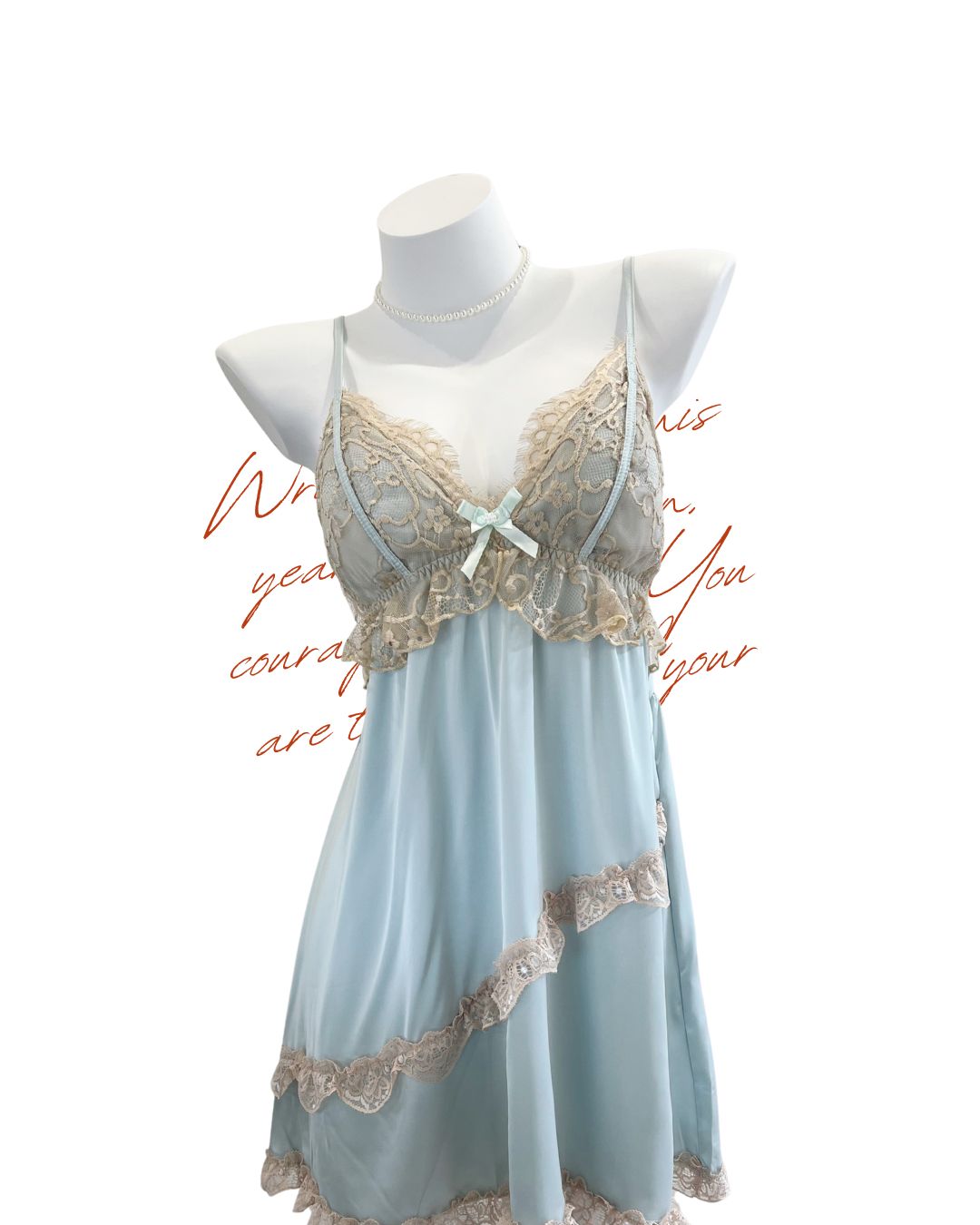 Light blue nightgown with lace details on a mannequin against a white background.