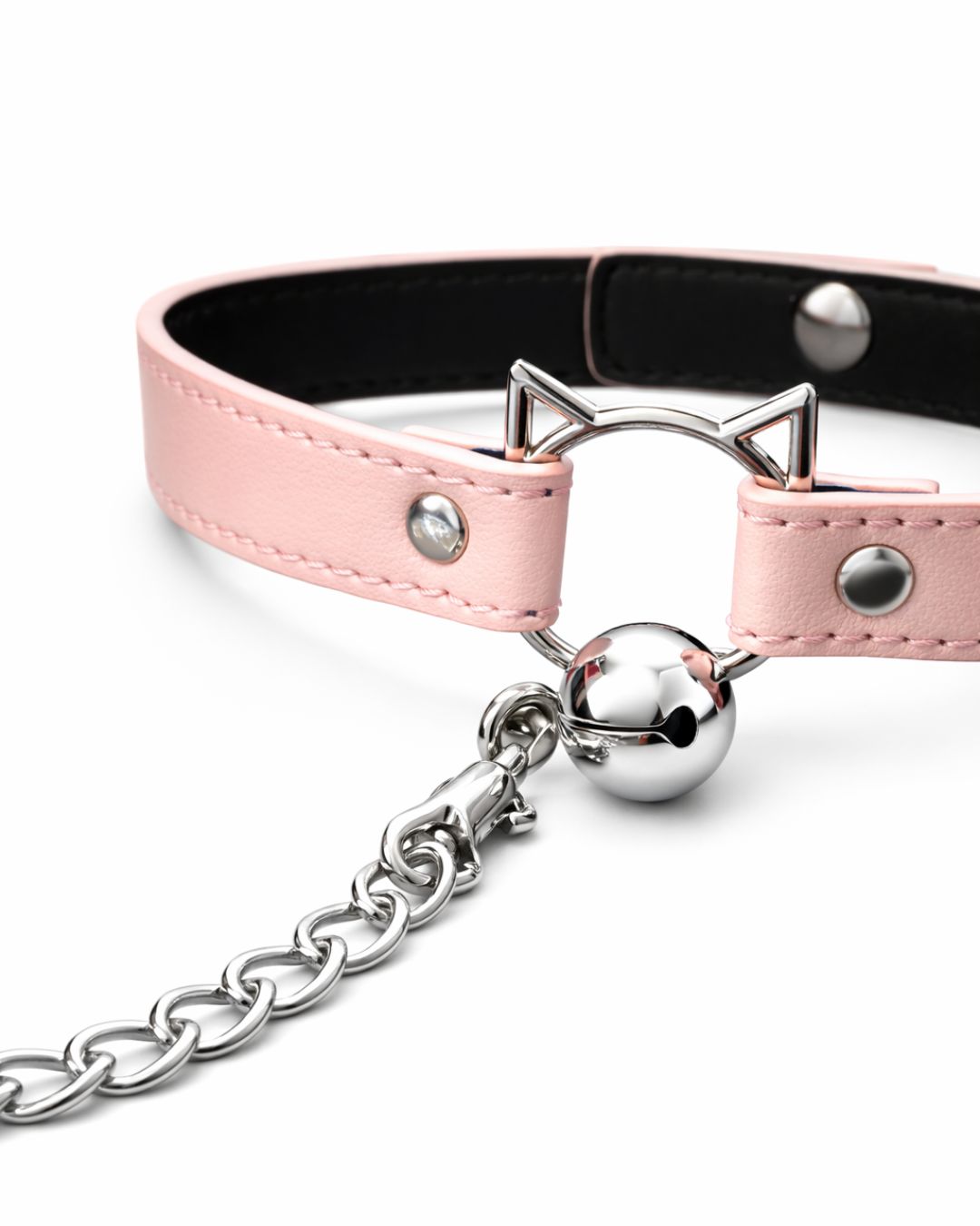 Pink BDSM  leather choker with silver cat ears and ball on a white background