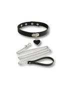 Black leather choker with heart pendant and silver chain on a white background