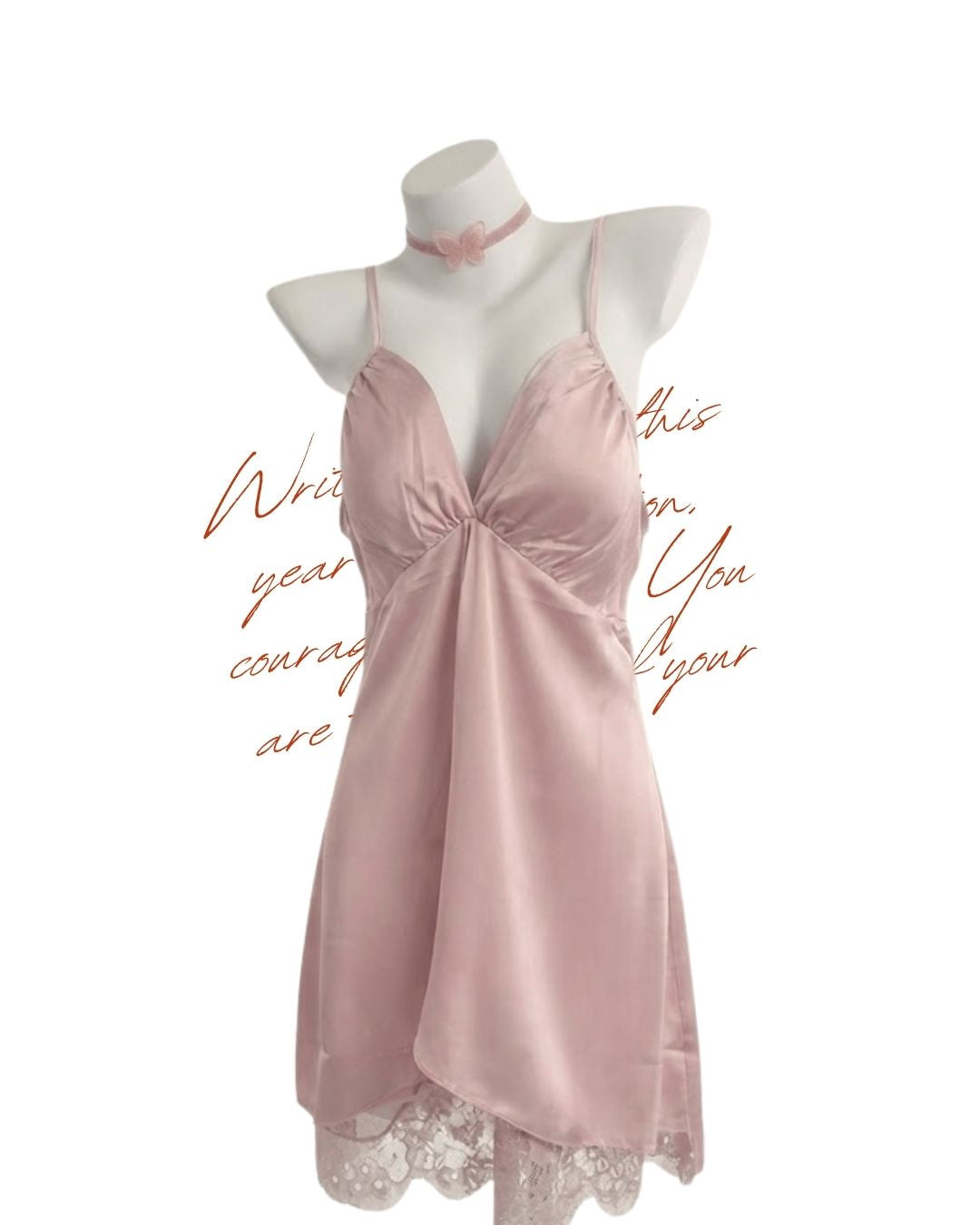 Pink satin nightgown on a mannequin with lace details against a white background